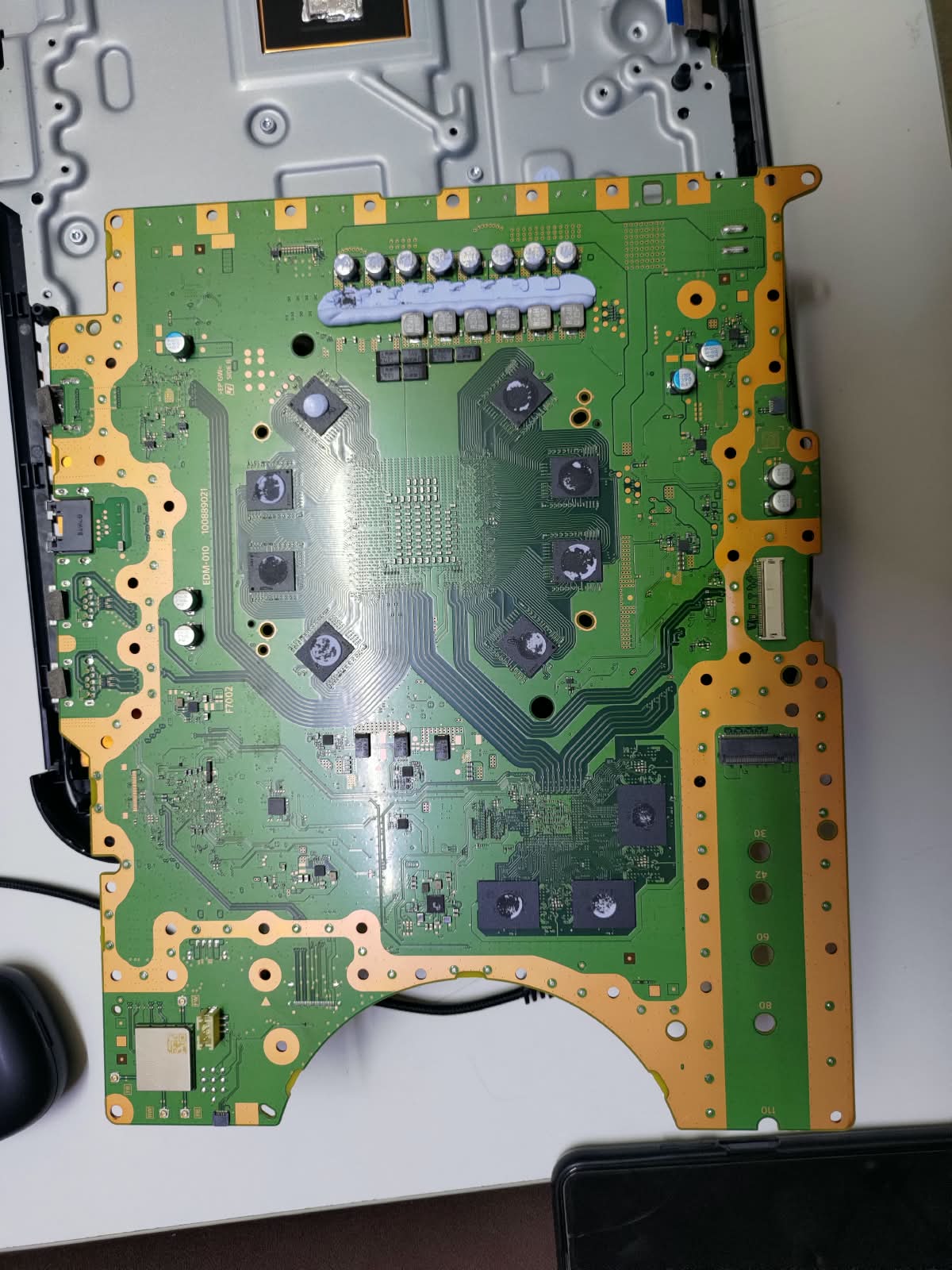 PS5 Digital motherboard under inspection