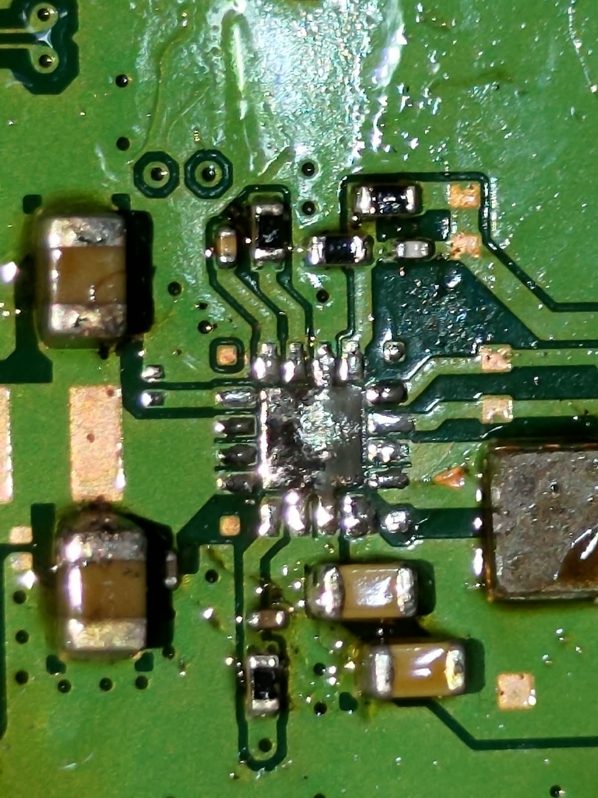 Faulty SBV chip removed from a PS5 motherboard
