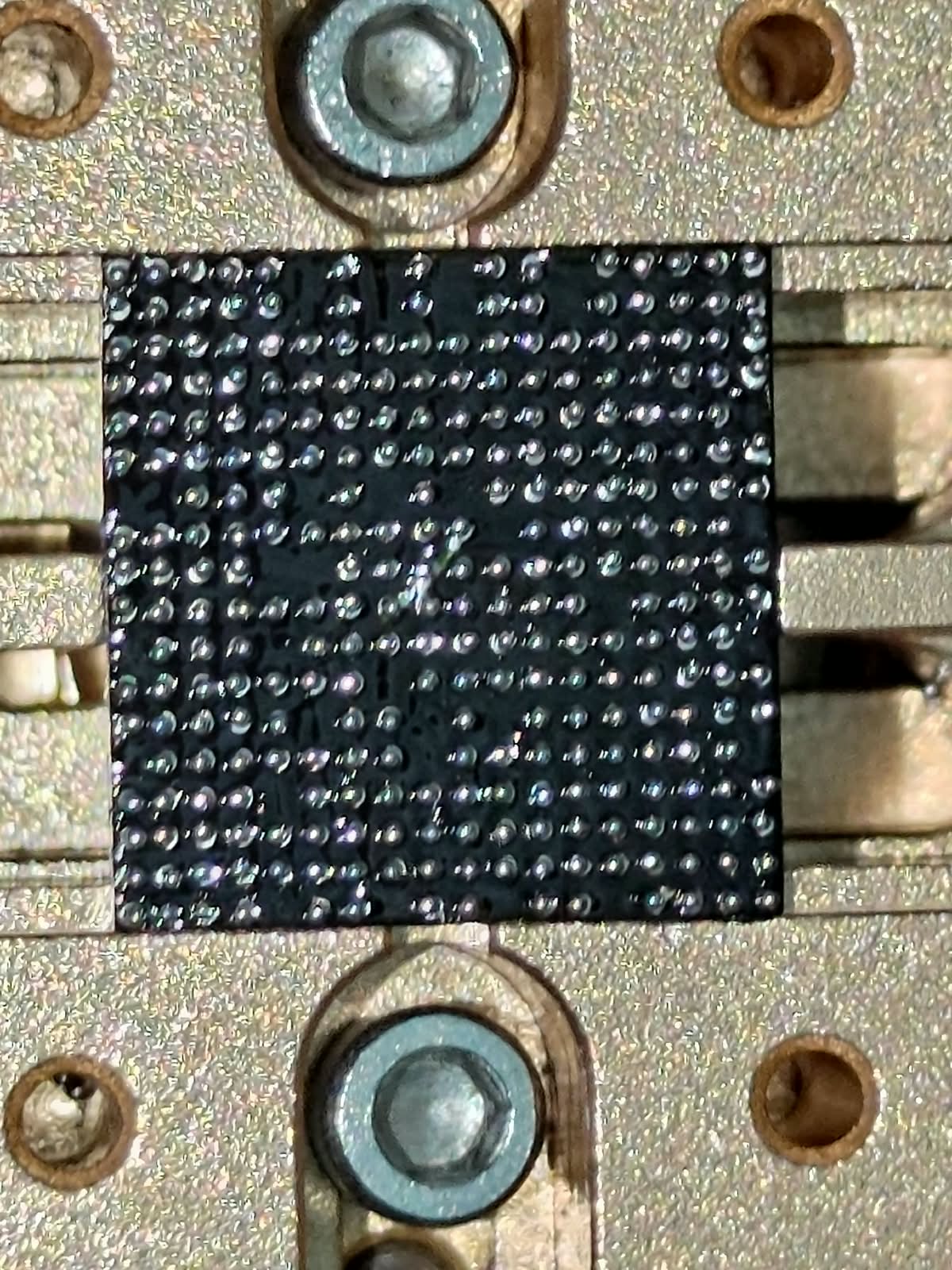 Fresh solder balls placed on a PS5 southbridge chip